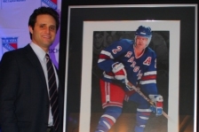 Adam posing with his painting
